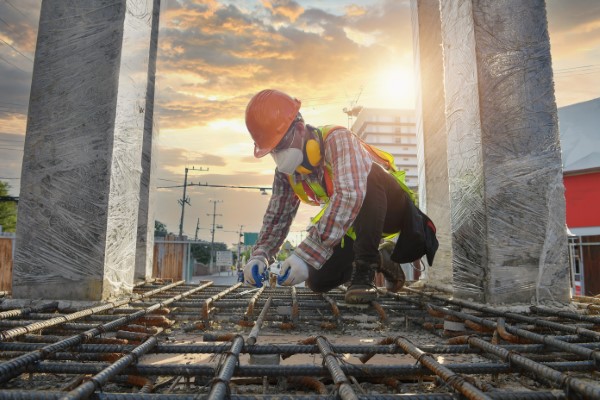 Worker with contruction iron lines for building foundation,Construction Worker